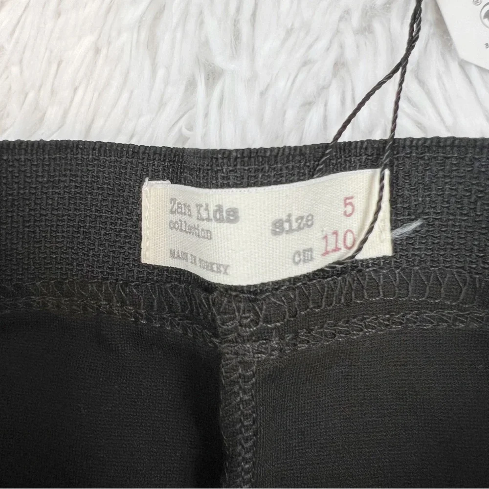 Zara‎ high waisted skinny pants in brown button details elastic waist
